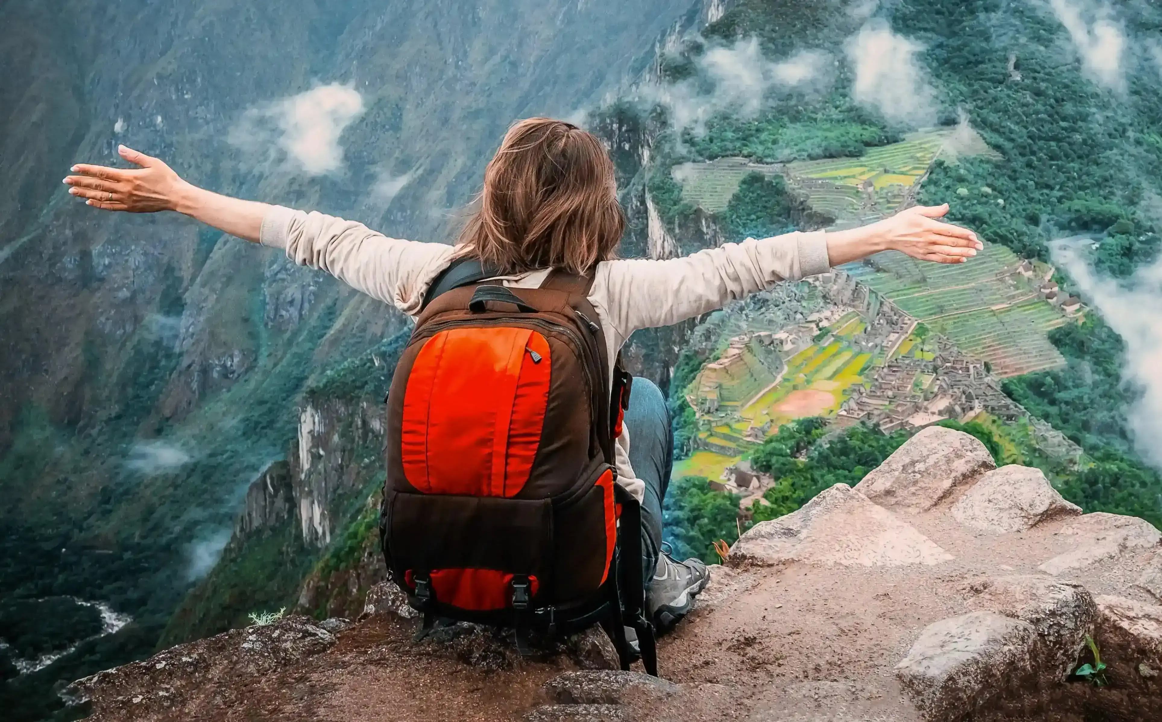 Adventure backpacker on mountain